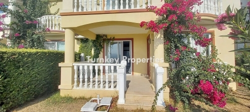 Garden Floor Apartment for Sale in a Social Complex with Flamingo Lake View in Bogazici