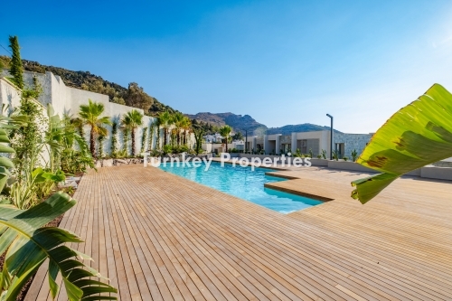 Turgutreis’te Kaliminos ve Marina Manzaralı 3+1 Satılık Daire | Ortak Havuz, Yerden Isıtma, Jeneratör ve Su Deposu Özellikleriyle