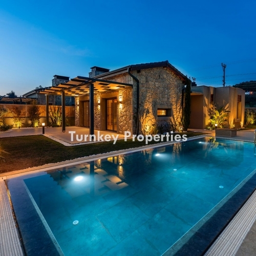 Luxury Villa for Sale in Bodrum, Yali with Hobby Garden, Private Pool, Underfloor Heating, Fireplace, and a Blend of Traditional Stone Craftsmanship with Modern Touches