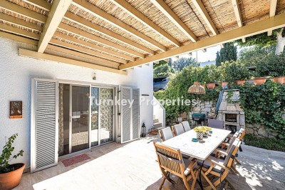 Luxury Villa for Sale in Gumusluk, Modern Design, Sea View, and Spacious Living Areas